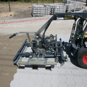 Chwytak hydrauliczny do maszynowego układania kostki brukowej